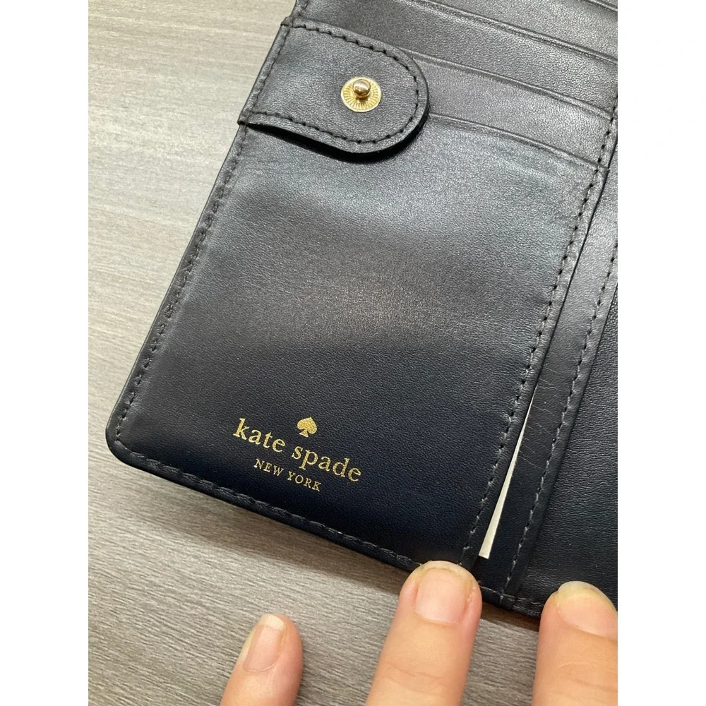 KATE SPADE NEW YORK CEDAR STREET BIFOLD STACY WALLET IN BLACK